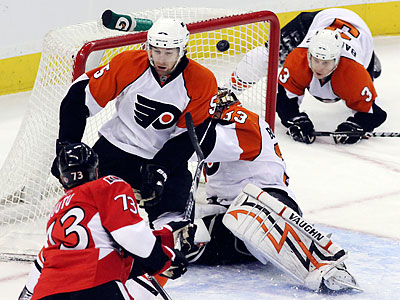 Brian Boucher gave up five of the Senators&acute; seven goals. (Fred Chartrand/Canadian Press/AP)
