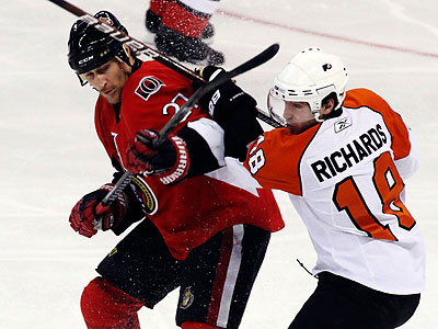 The Flyers&acute; line of Mike Richards, Claude Giroux and Simon Gagne was collectively minus-15 against Ottawa. (Fred Chartrand/Canadian Press/AP)