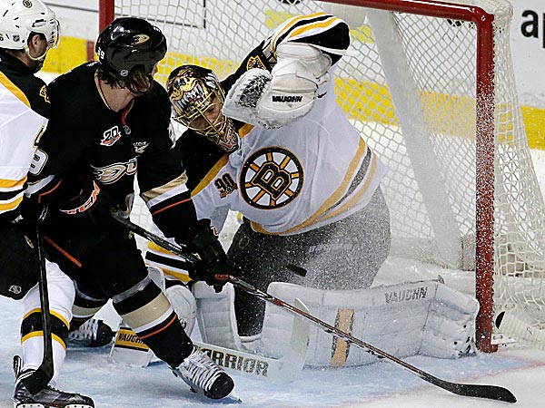 Bruins goalie Tuukka Rask blocks shot by Ducks left wing Matt Beleskey. (Chris Carlson/AP)