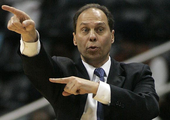 76ers coach Tony DiLeo calls a play during the first half. (John Amis/AP) 