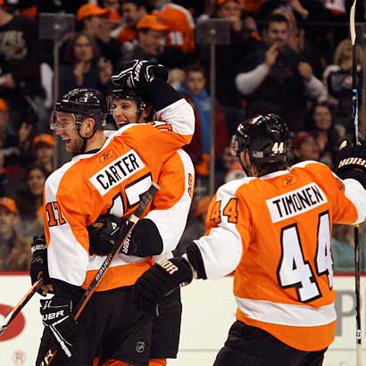 Philadelphia Flyers Arron Asham reacts after scoring a goal in the
