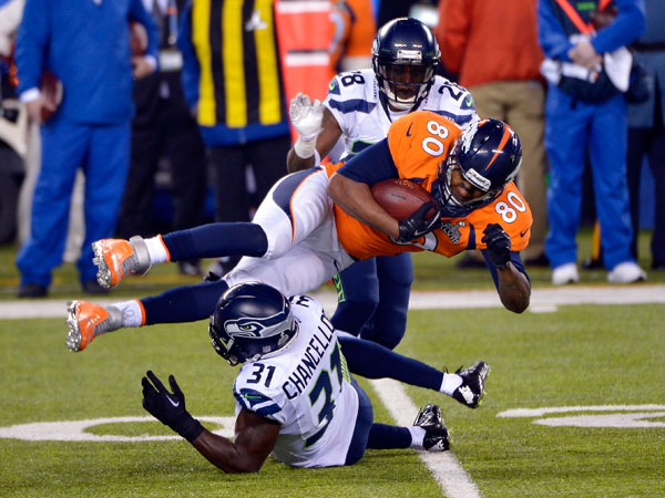 Seattle Seahawks kick returner Percy Harvin returns a kick off 87 yards for  a touchdown against the Denver Broncos to start the third quarter of Super  Bowl XLVIII at MetLife Stadium in