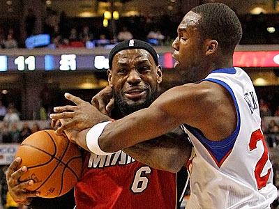 Sixers guard Jodie Meeks stops Heat forward LeBron James from scoring in the first quarter. (Ron Cortes/Staff Photographer)