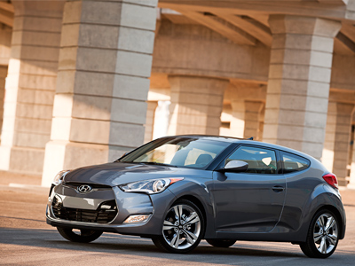 With sporty styling and standard high-tech features, the Hyundai Veloster — the automaker&acute;s fourth new car that earns a fuel mileage rating of 40 miles per gallon on the highway — sure doesn&acute;t look like a fuel miser.
