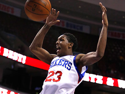 Lou Williams celebrates after throwing down a slam during the fourth quarter. (Ron Cortes/Staff Photographer)