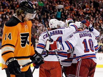 Sean Couturier and the Flyers are 3-4-3 in their last 10 games. (Matt Slocum/AP)
