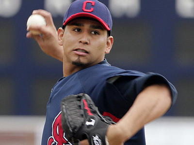 Cleveland Indians pitcher Carlos Carrasco throws live batting