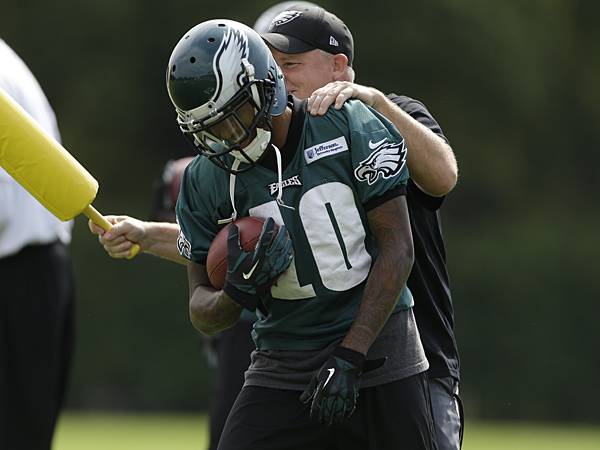 Eagles wide receiver DeSean Jackson and head coach Chip Kelly during practice back in September 2013. (Matt Rourke/AP)