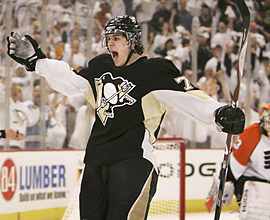 Penguins star Evgeni Malkin had plenty of reason to celebrate in Pittsburgh&acute;s 4-2 win over the Flyers. (Keith Srakocic/AP)