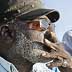 Richard "Friday" Grayson of Camden (left) was not fishing today but he was talking about fishing with Devon James of Camden who was fishing (on right) while relaxing at the Father Doyle Fishing Pier in Camden on May 18, 2012. ( ELIZABETH ROBERTSON / Staff Photographer )
