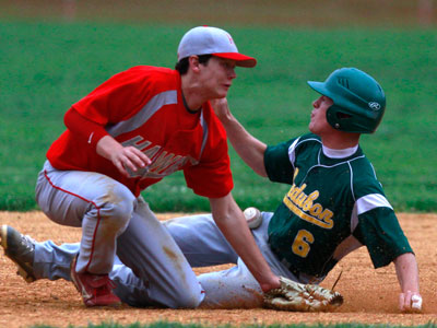 Haddon Township&acute;s Kevin Griese tries to tag out a baserunner at second. (David Swanson/ Staff Photographer ) 