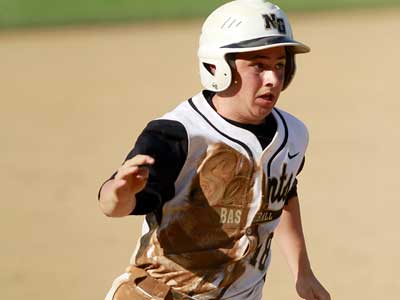 Neuman Goretti&acute;s Joe Lolio rounds third and to home for the 5-4 overtime eighth inning win over La Salle. (David Swanson/Staff Photographer)