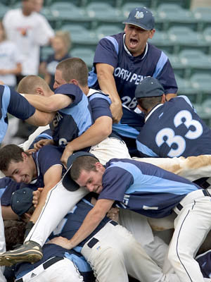 North Penn defeated Parkland, 3-1, Friday at Blair County Ballpark in the PIAA Class AAAA baseball championship. In this photo, North Penn ballplayers celebrate on the field as they pile up on each other after their win. (Ed Hille / Staff Photographer)