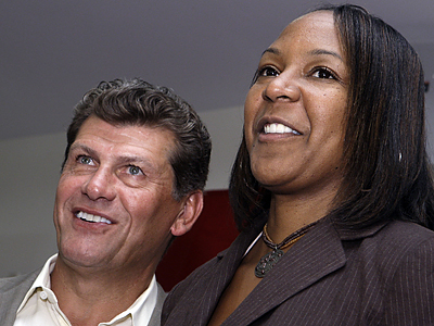 New Temple women&#39;s basketball coach Tonya Cardoza and her old boss at Connecticut, Geno Auriemma. (Matt Rourke/AP) - 070108_cardoza