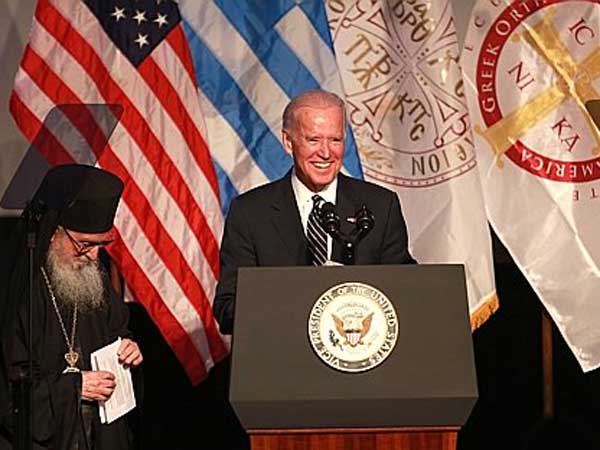 Vice President Joe Biden is introduced by his Eminrence Archbishop Demetrios of America *( R  ) at the Grand Banquet of the 42nd Biennial Clergy-Laity Congress of the Greek Orthodox Archdiocese of America in Philadelphia Wednesday July 9, 2014. ( DAVID SWANSON / Staff Photographer )