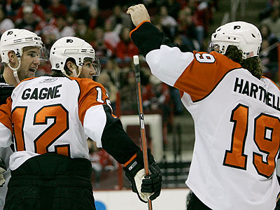 "It was hard to see him go," Scott Hartnell said of Simon Gagne&acute;s departure from the Flyers. (Gerry Broome/AP file photo)