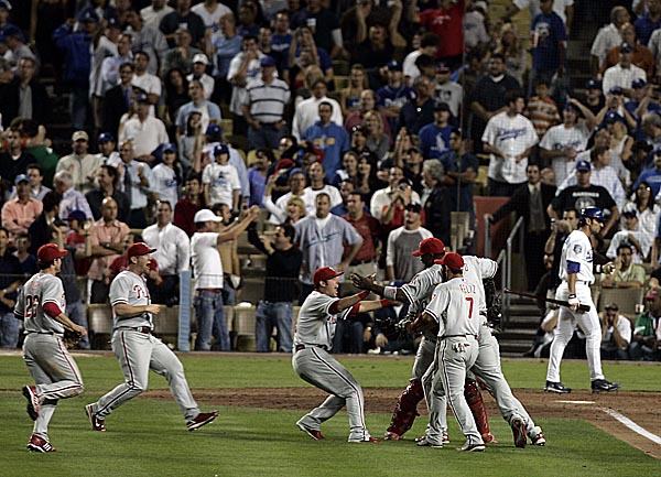 The Philadelphia Phillies celebrate as they advance to the World Series after beating the Dodgers in game five of the NLCS at Dodger Stadium October 15, 2008. ( Michael Perez / Staff Photographer )