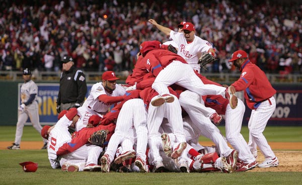 Oct 29, 2008 - Philadelphia, Pennsylvania, USA - Phillies JIMMY ROLLINS  holds the World Series trophy next to BRETT MYERS at Citizens Bank Park.  The Philadelphia Phillies faced the Tampa Bay Rays