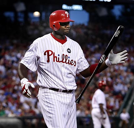 Philadelphia Phillies baseball player Ryan Howard waves as he is introduced  during a news conference, to announce a donation from the Ryan Howard Family  Foundation to the School District of Philadelphia, at