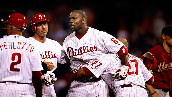 Philadelphia 76ers' cheerleaders escort Philadelphia Phillies MVP Ryan  Howard onto the court before the start of the Sixers' game with the Detroit  Pistons at the Wachovia Center in Philadelphia, Pennsylvania, Tuesday,  November