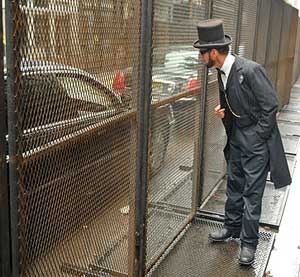 Rick Miller, a "Living Lincoln,", talks to a chauffeur down the street from the 2009 G-20 Summit. Miller, a Penn State grad, lives north of Pittsburgh in the suburb of Cranberry.