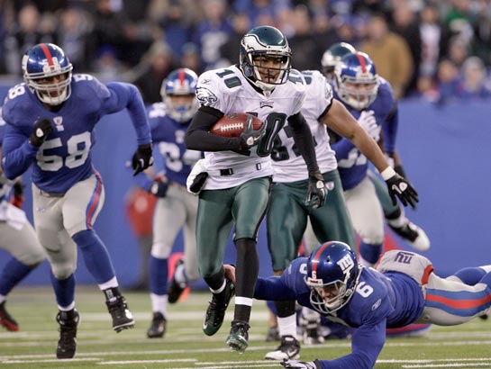 Philadelphia Eagles Michael Vick stands on the sidelines in the first  quarter against the New York Giants at New Meadowlands Stadium in week 15  of the NFL in East Rutherford, New Jersey