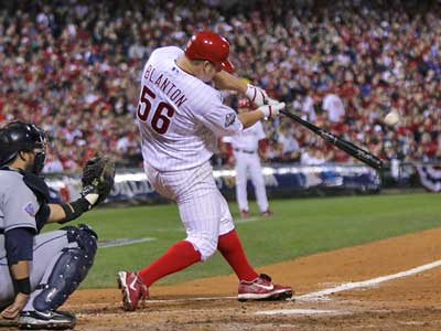 Phillies pitcher Joe Blanton homers in the fifth inning of Game 4. Blanton allowed just two runs in six innings on the mound. (Yong Kim / Staff Photographer)