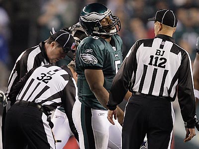 Donovan McNabb disagreed with a controversial ball spot on a fourth down play in the fourth quarter. (David Maialetti/Staff Photographer)