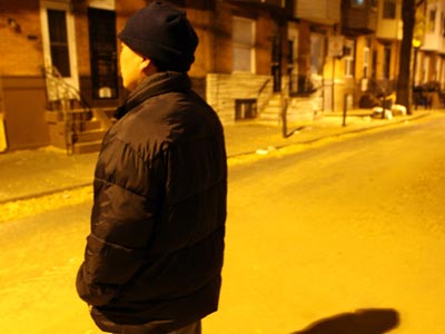 An illegal immigrant worker stands in the middle of his South Philadelphia street.  (Yong Kim / Staff Photographer) <br />