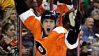 Philadelphia Flyers left wing James van Riemsdyk celebrates his goal in the second period of an NHL hockey game with the Carolina Hurricane (AP Photo/Tom Mihalek)