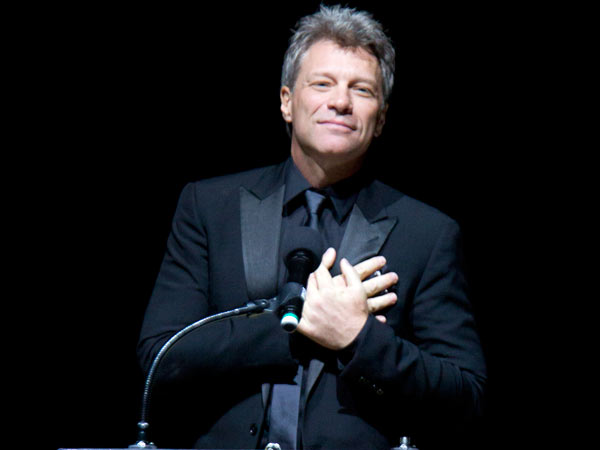 Jon Bon Jovi places his hands over his heart after receiving the Marian Anderson Award on Nov. 18, 2014. ( CHARLES FOX / Staff Photographer )