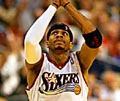 Sixers Allen Iverson puts his arms up in the air after making a three point basket in the fourth quarter against the Miami Heat, Tuesday, 10/28/2003.  The Sixers beat the Heat 89-74.  DN Photo/ Yong Kim<br /><br />