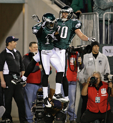 Kevin Curtis and DeSean Jackson celebrate Curtis' touchdown catch in the first quarter. (Yong Kim/Staff Photographer)