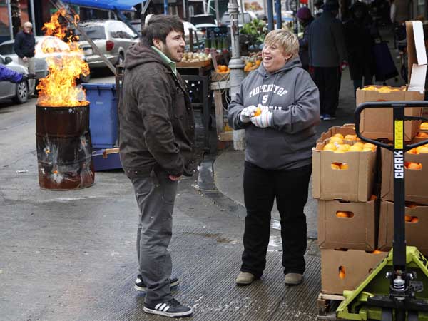 Michele Gambino (right), business manager, United Merchants of the South 9th Business Association, talks with merchant Jonathan Rivera (left) of Tortilleria San Roman. The Italian Market is now more the Italian-Mexican-Vietnamese Market. December 17,  2013.( MICHAEL S. WIRTZ / Staff Photographer )