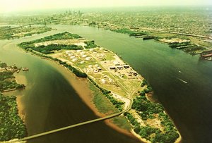 Petty's Island , shown here in a 1992 aerial photo courtesy of Citgo, the island's owner. For more than two years, an environmental controversy has swirled around what to do with the site.