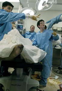 Temple University Hospital's trauma chief, Amy Goldberg , as she evaluated a 2006 gunshot victim. "This is a long-term problem, which will take a multitude of solutions and many, many people," she told state lawmakers yesterday.
