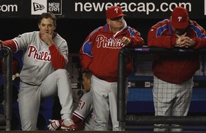 Pat Burrell (left) watches the game slip away in the ninth. He was joined by coach Jimy Williams (center) and manager Charlie Manuel.