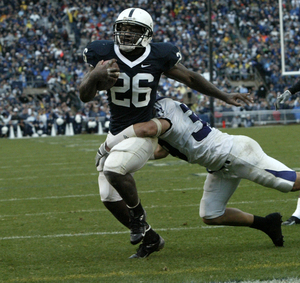 Penn State's Tony Hunt breaks a tackle to score against Northwestern in a game last September. Hunt had pedestrian times in the 40, but some draft experts see him as a tough, complete back.