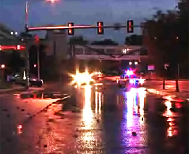 Police close off part of University Avenue as a broken water main snarls traffic in West Philadelphia this morning.
