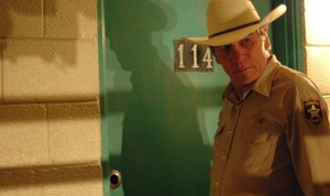 Tommy Lee Jones is Ed Tom Bell, sheriff with a full plate, in "No Country for Old Men."