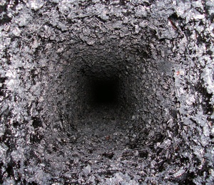 Chimney creosote and moisture from the air cause odor.