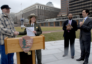 You can say anything you want - provided you get approval first. Darla Sidles of the Park Service grants David Miller the first permit to speak at People's Plaza. Also there: Mayor Nutter and Joe Torsella of the Constitution Center.