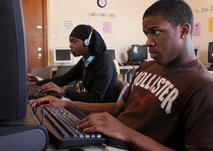 At the Southwest e3 Center, which offers second chances, Darlene Keels and Joshua Smith work on their computer-lab assignments.