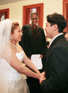 Nothing funny about this Valentine - it's the real deal. Elba Campoverde (left) and Manuel Panora were among 40 couples married in 45 minutes by Judge Lisette Shirdan- Harris at City Hall's Valentine's Day Wedding Extravaganza.