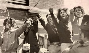 Members of MOVE at a 1978 news conference outside their house on North 33d Street in Powelton Village, where the deadly confrontation later erupted.