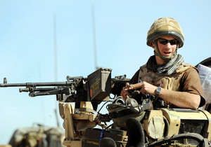Britain's Prince Harry does his duty atop a military vehicle in the Helmand province of southern Afghanistan. Harry has been serving there for 10 weeks. (See "A prince on the front lines.")