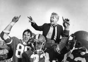 Then-coach Vince McAneney is carried off the field by his Pennsauken players after a big win over Cherokee in 1984.