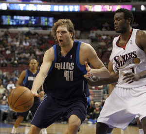 Samuel Dalembert, guarding Mavs' Dirk Nowitzki, is looking for fun in playing basketball.