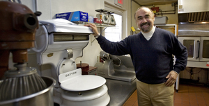 With a dicey economy cutting profits, owner Jack McFadden weighs provisions delivered to the Gables at Chadds Ford.
