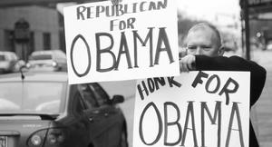 John Mosure shows support for Obama in Fort Wayne, Ind., yesterday, where Bill Clinton appeared.